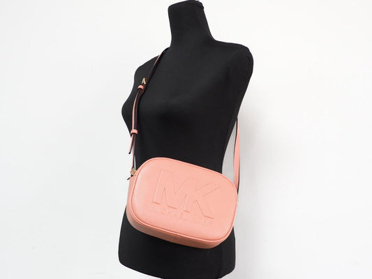 Michael Kors Michael Kors Jet Set Travel Medium Sherbert Leather Oval Camera Crossbody Bag